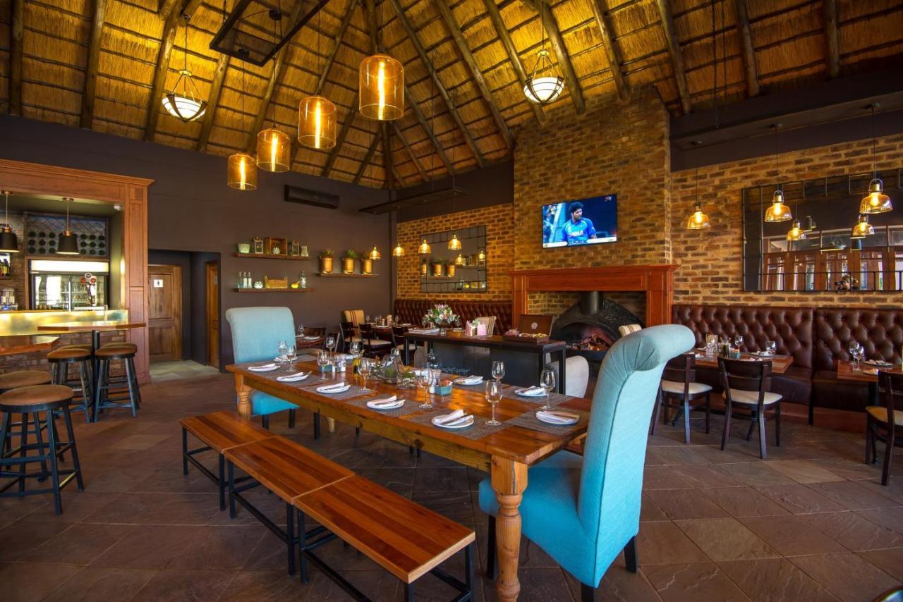 Kloofzicht Lodge & Spa 크루거스도프 외부 사진 The interior of the restaurant